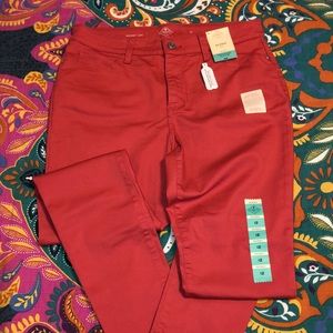 St John’s Bay Coral colored skinny jeans size 12